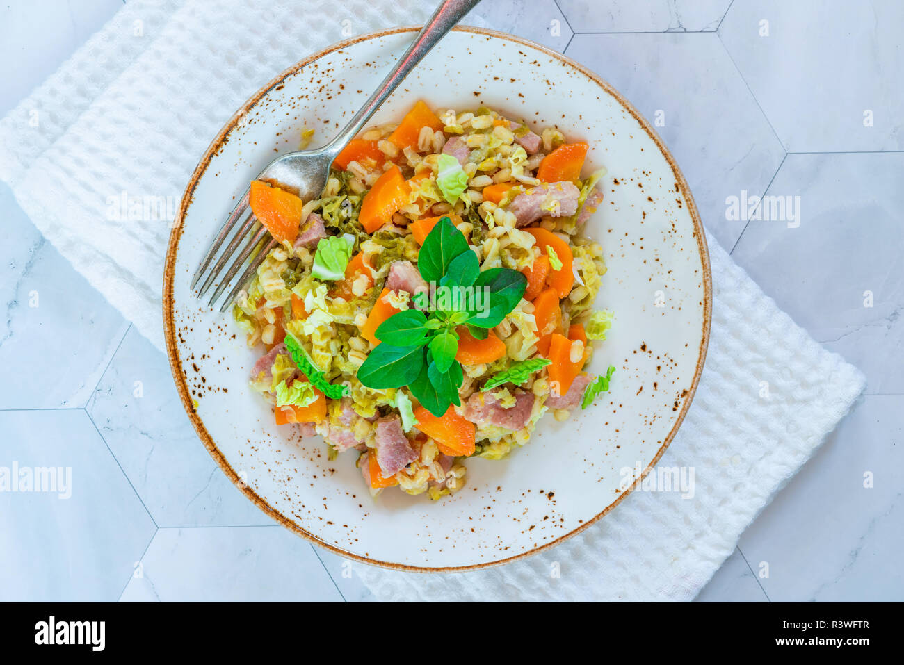 Pearl barley and bacon cassarole with carrots, leek and savoy cabbage