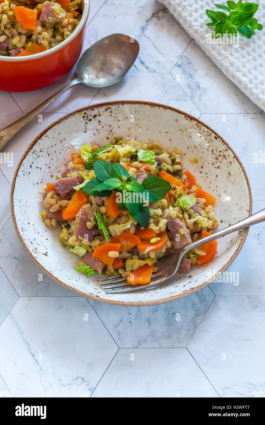 Pearl barley and bacon cassarole with carrots, leek and savoy cabbage