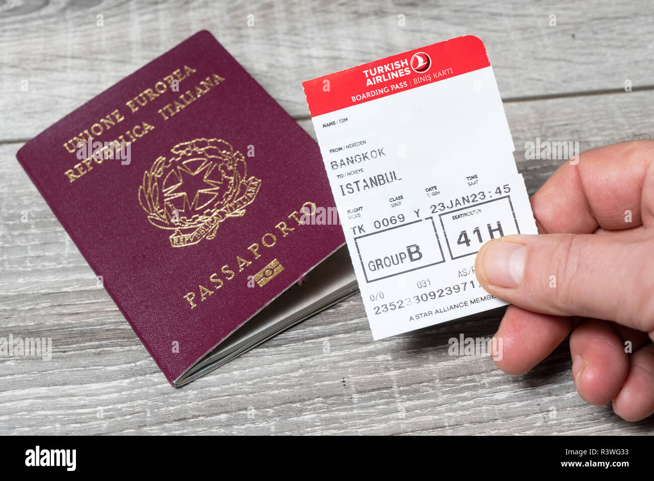 the Italian passport with the Turkish Airlines boarding pass Stock Photo -  Alamy