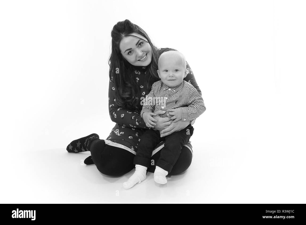 Mum cuddling toddler Black and White Stock Photos &amp; Images - Alamy