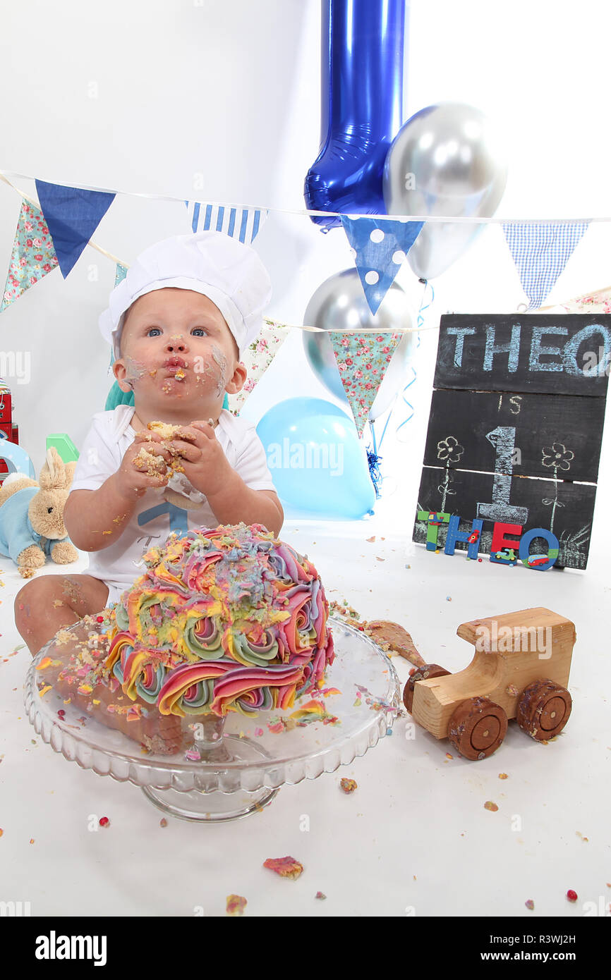 1 year old toddler, cake smash birthday cake Stock Photo