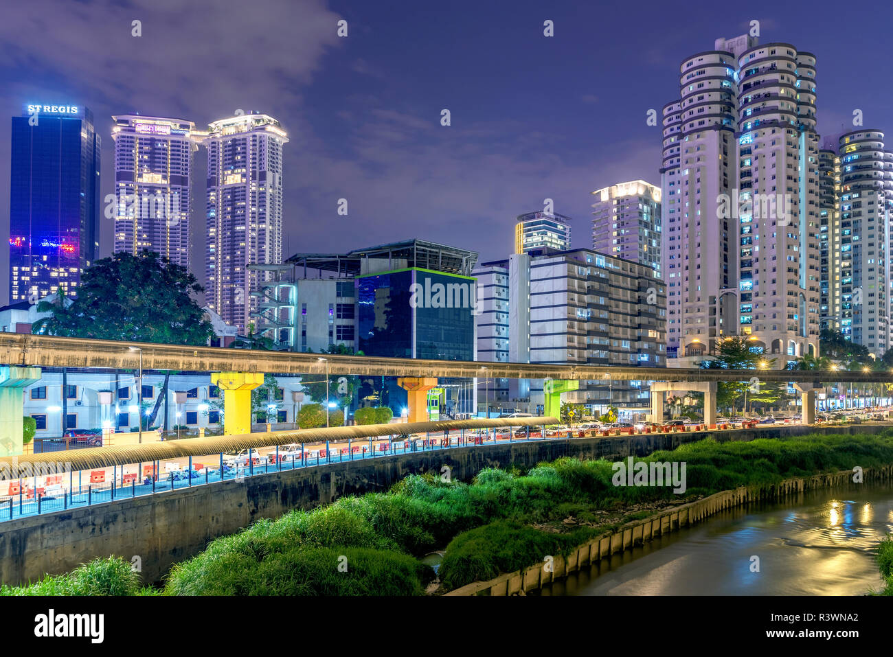 KUALA LUMPUR, MALAYSIA - JULY 28: This is a night view of modern city buildings along the Klang River on July 28, 2018 in Kuala Lumpur Stock Photo