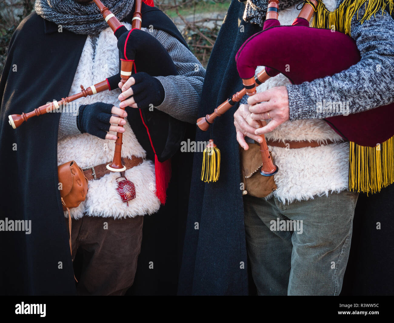 Bagpipe players in gowns during a traditional festival Stock Photo Alamy