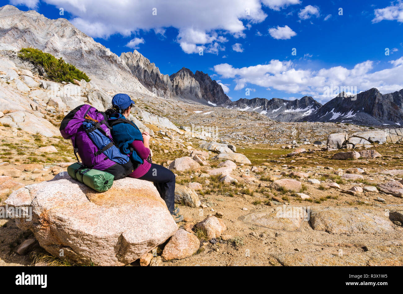 Backpacker on the Bishop Pass Trail in Dusy Basin, Kings Canyon National Park, California, USA (MR) Stock Photo