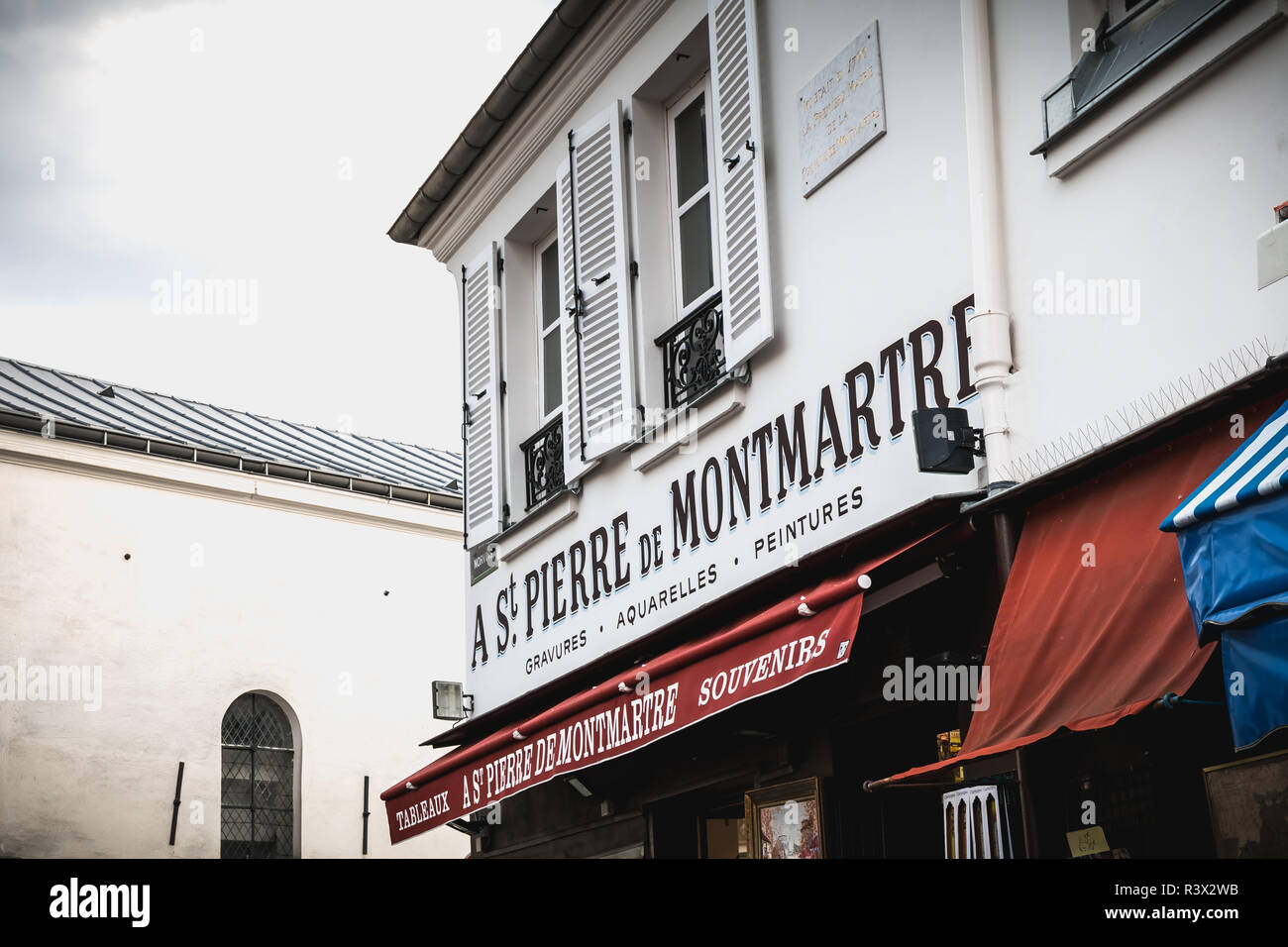 Paris, France - October 6, 2018: St Pierre de Montmartre painting canvas storefront on the Place du Tertre in the famous district of Montmartre on a f Stock Photo