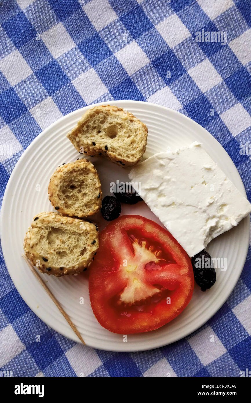 Meze of Boukies (Small Rusks) Feta Cheese, Salami and Tomato, Crete, GreeceM Stock Photo