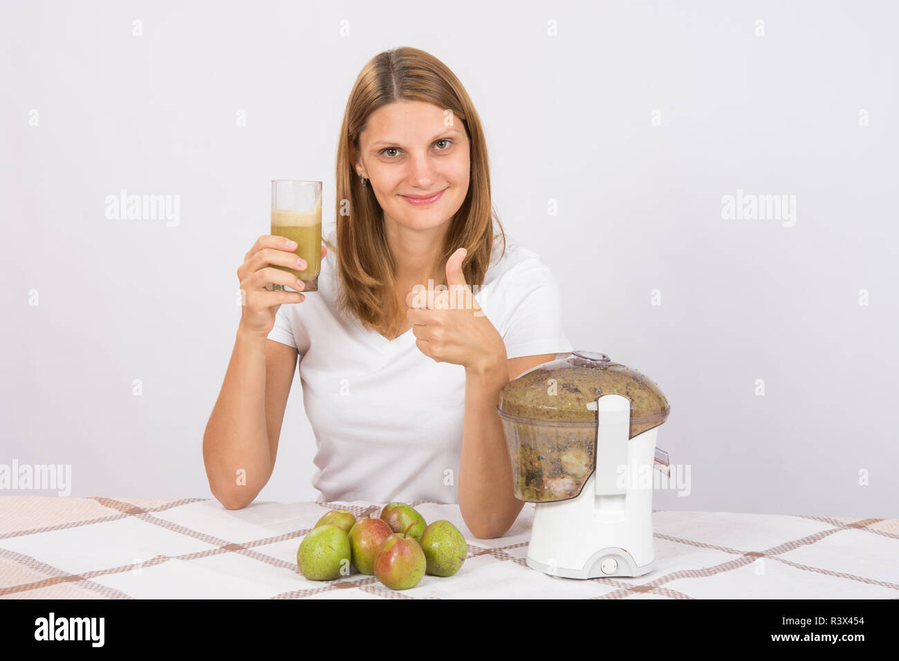 She likes to drink fresh juices Stock Photo Alamy
