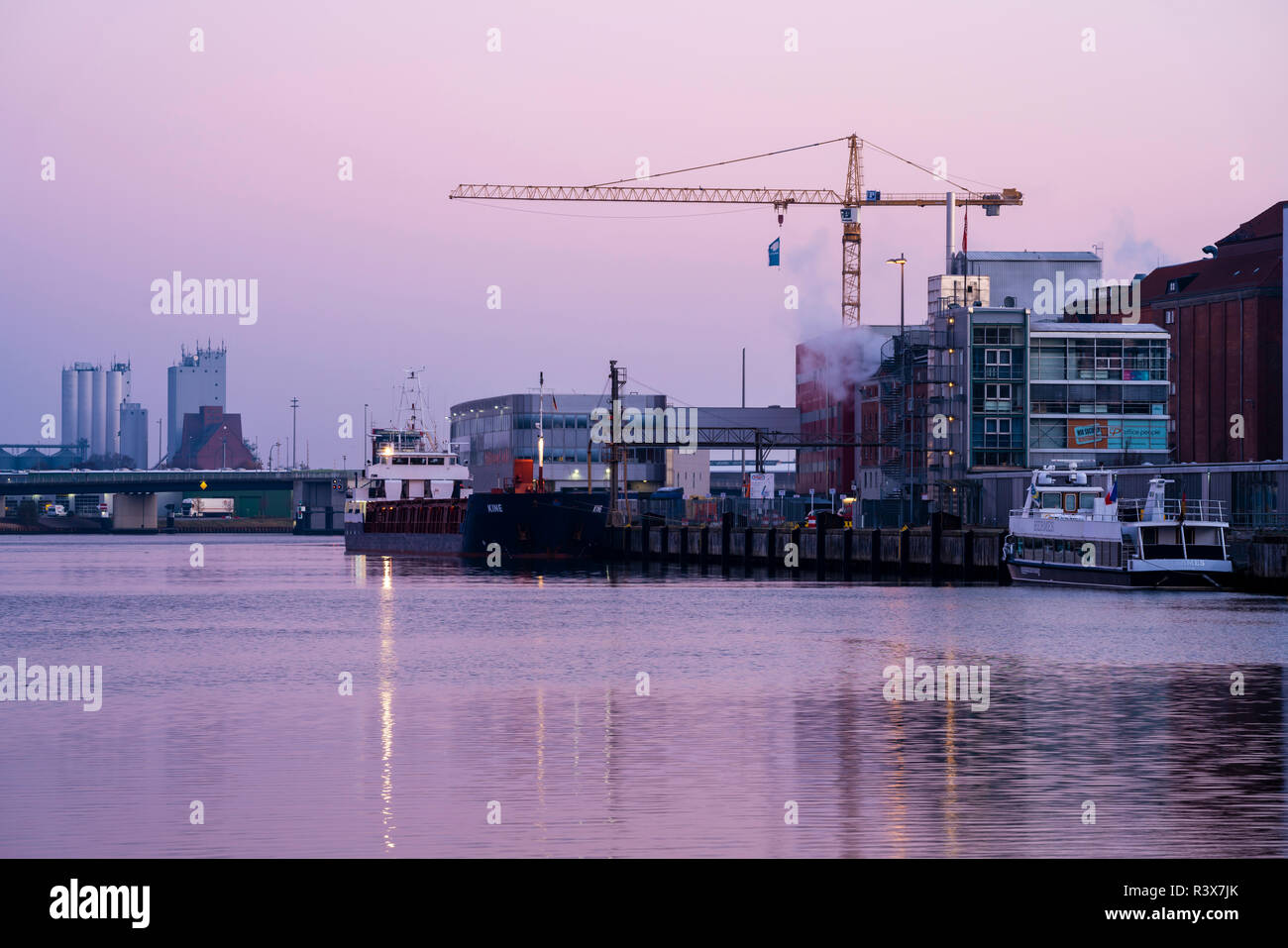 A view on the harbor in Lübeck during dawn Stock Photo