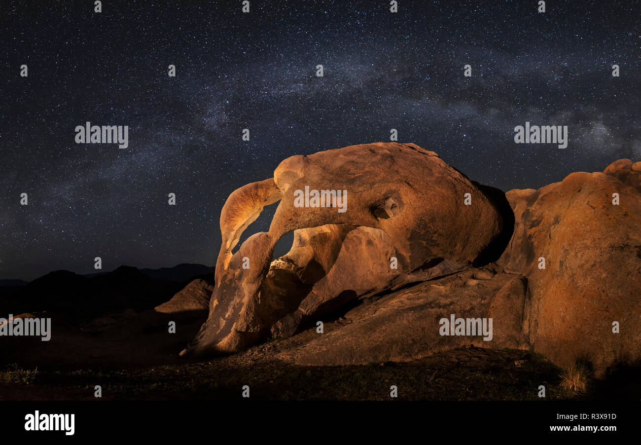 usa-california-alabama-hills-milky-way-and-lit-cyclops-arch-stock