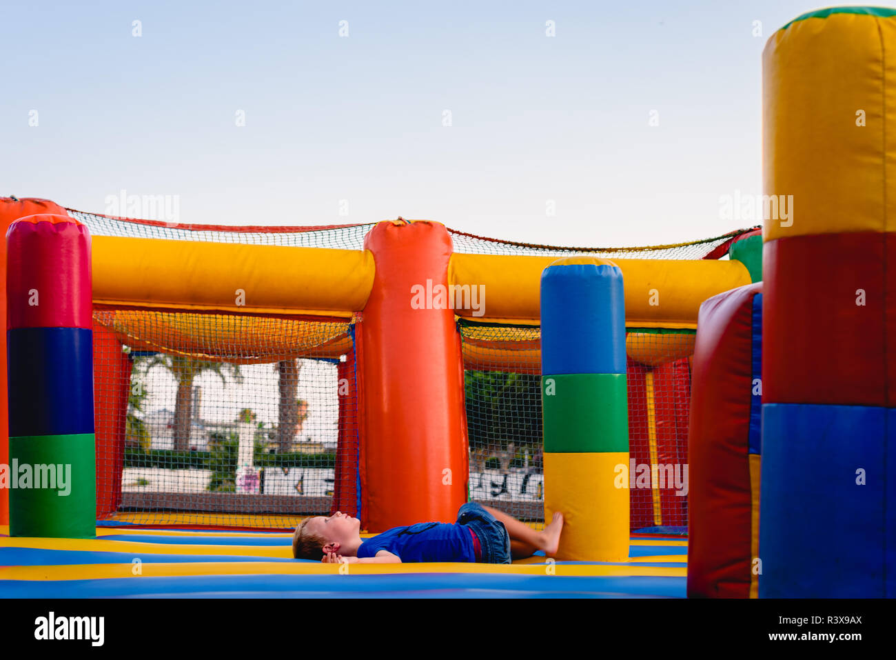 Inflatable castle of many colors without anyone. Stock Photo