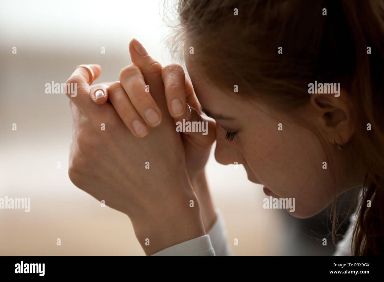 Close up of upset female feel frustrated with bad news Stock Photo