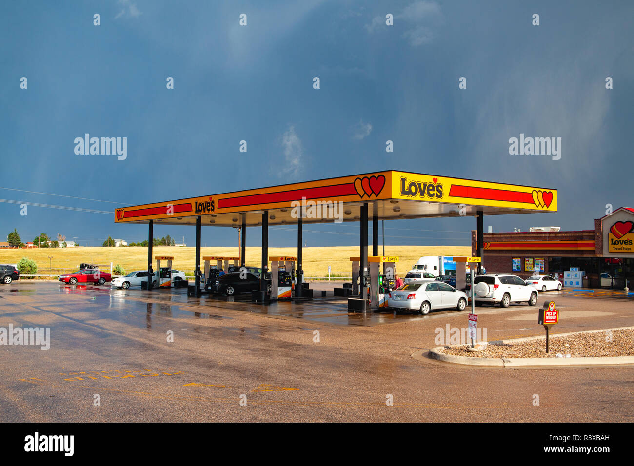 Denver,USA - July 18,2013: Love's gas station after heavy storm.Love's provides professional truck drivers and motorists with 24-hour access to clean  Stock Photo