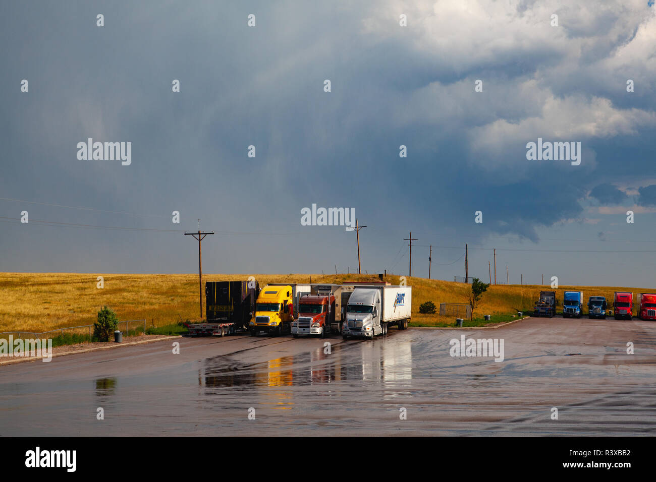 Denver,USA - July 18,2013: Parking place in Love's gas station after heavy storm.Love's provides professional truck drivers and motorists with 24-hour Stock Photo