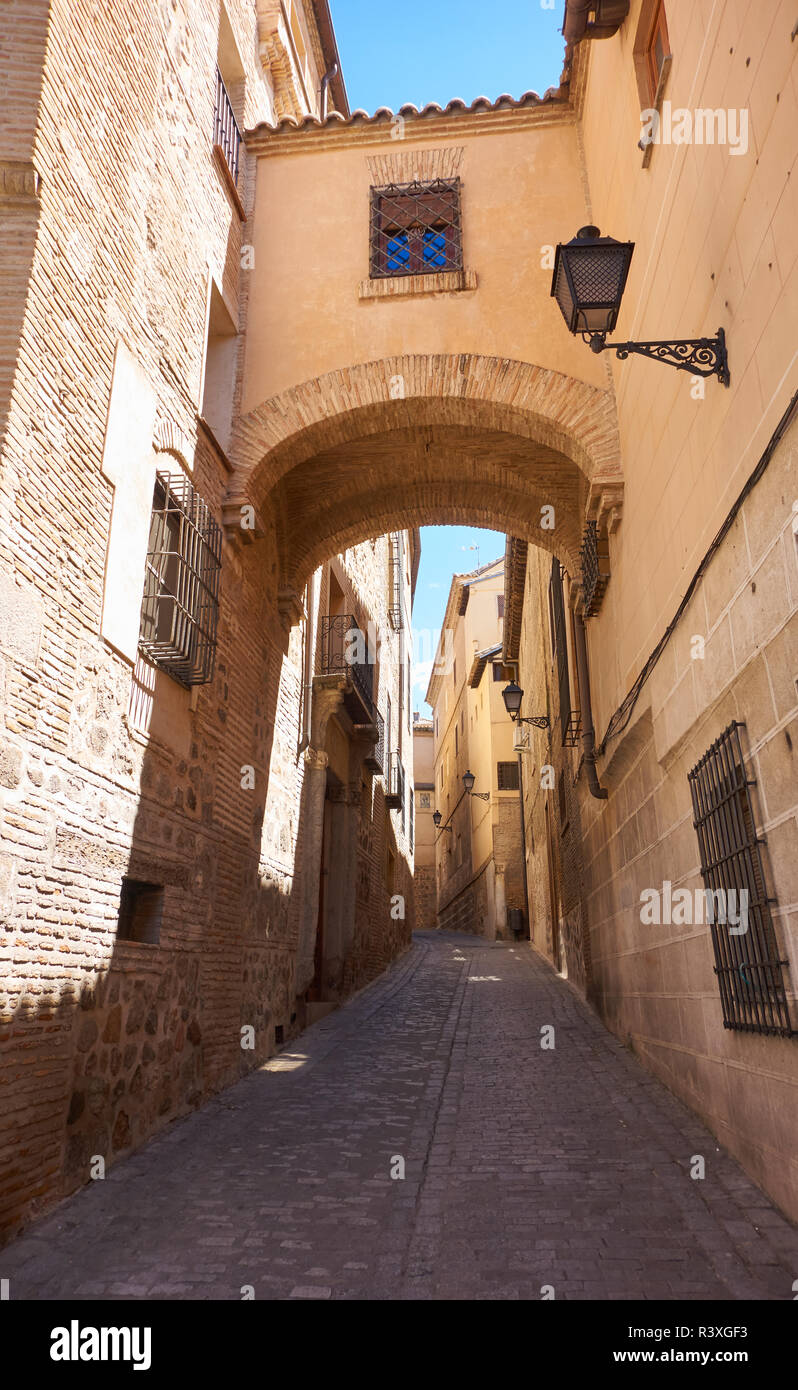 Toledo juderia arch in Castile La Mancha of Spain Stock Photo