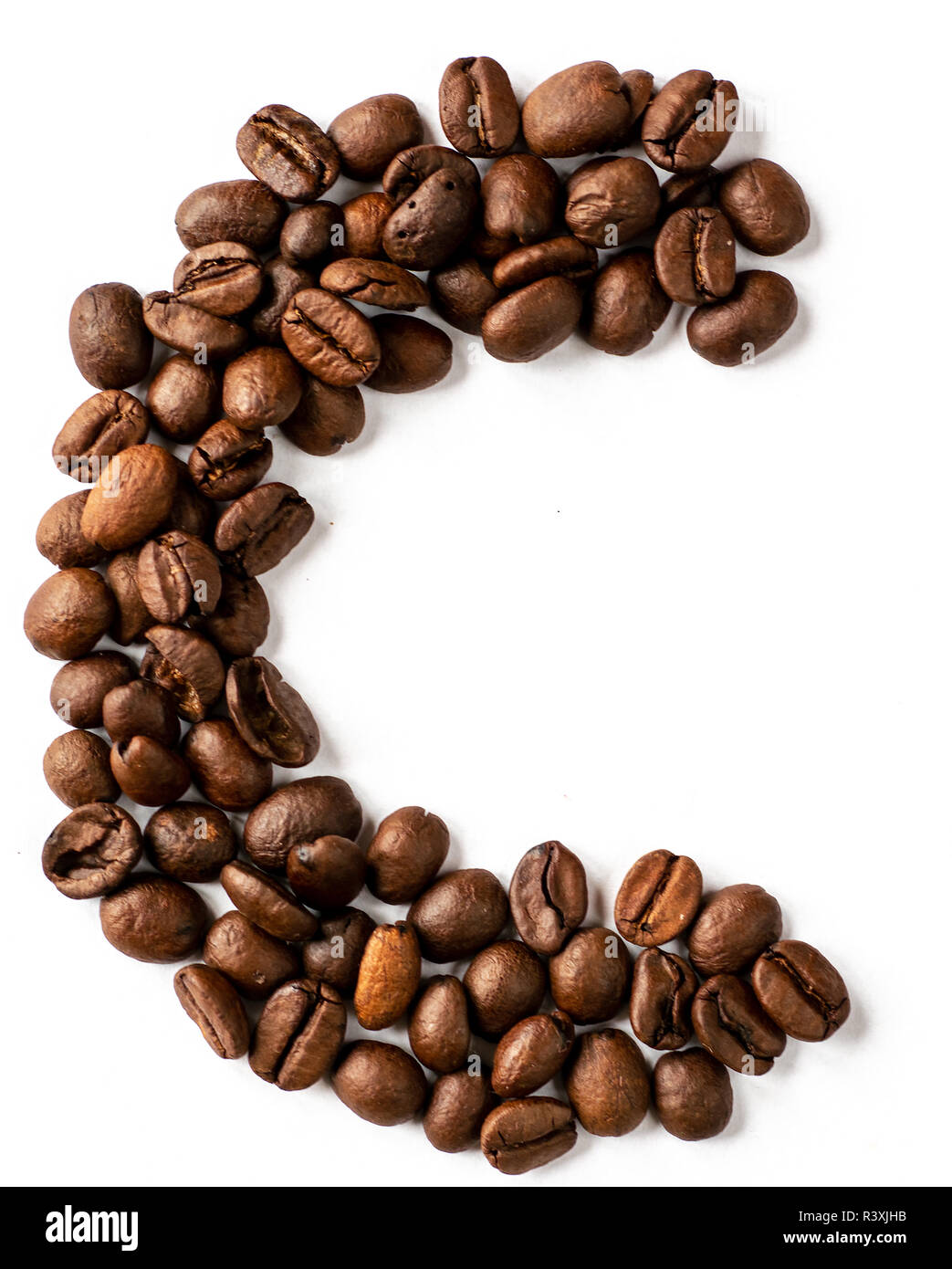 letters made from coffee beans isolated on white background Stock Photo