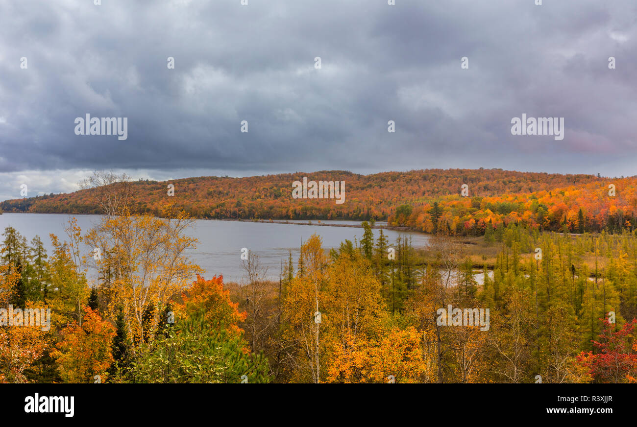 Autumn color abounds along Goose Lake near Negaunee, Michigan, USA