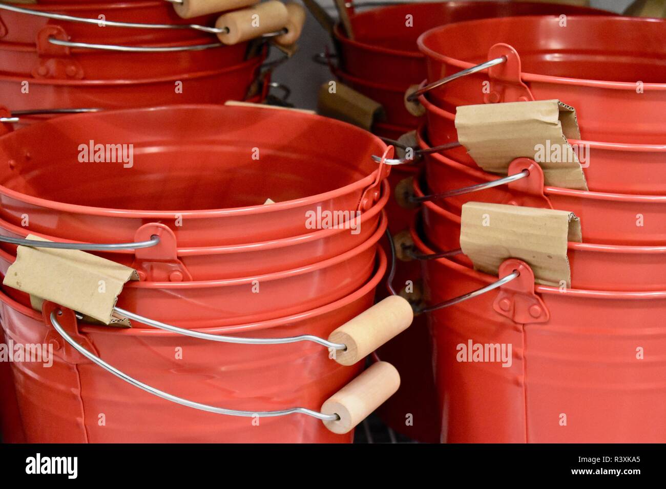 red metal buckets in ikea store, sweden Stock Photo Alamy