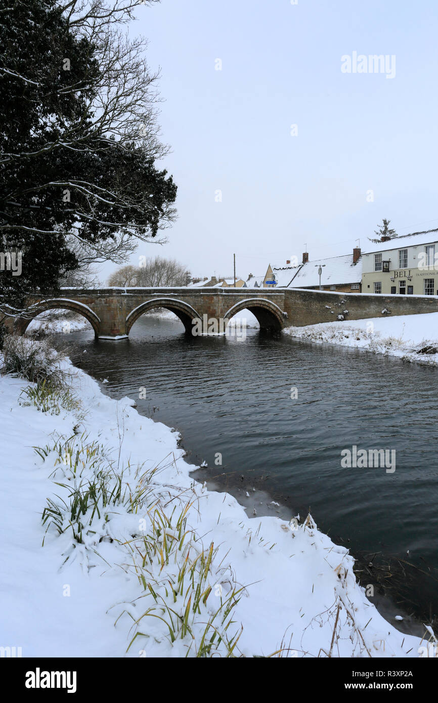 Winter snow; river Welland Stone Bridge; Deeping St James; Lincolnshire; England; UK Stock Photo