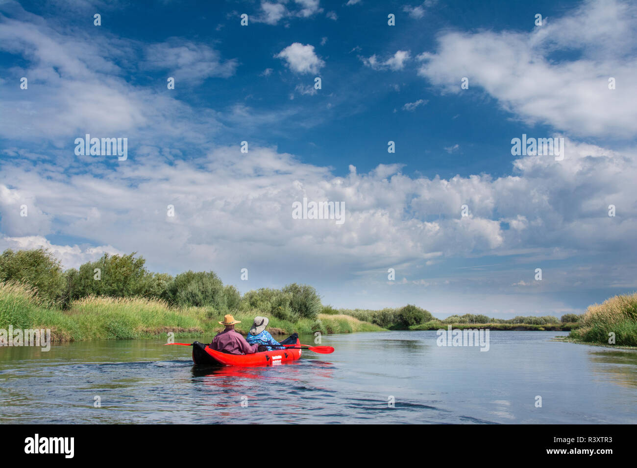 Couple kayaking the Teton River, Driggs, Idaho. (MR) Stock Photo