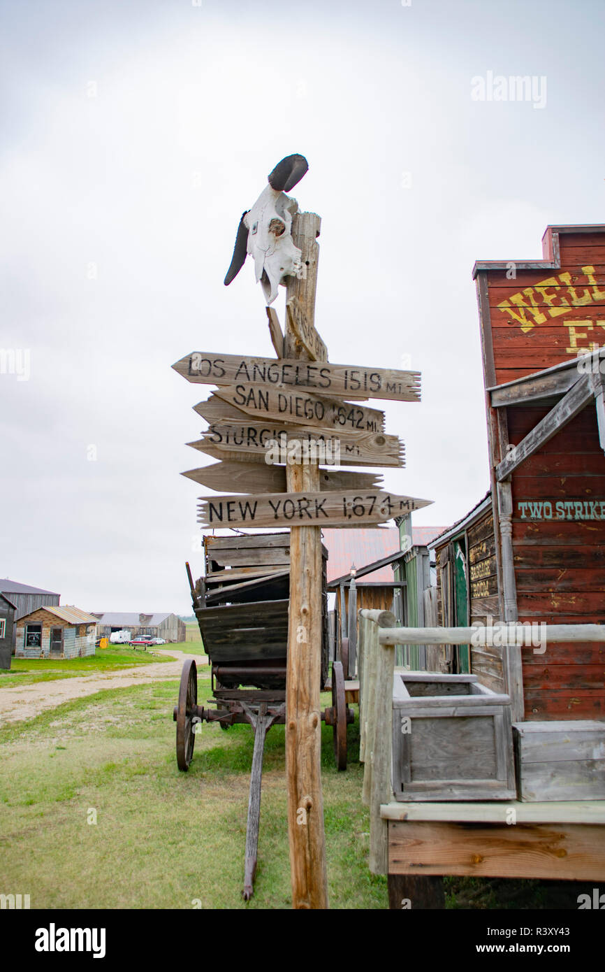 A direction post in 1880 Town, South Dakota, movie set for Dances With Wolves. Stock Photo