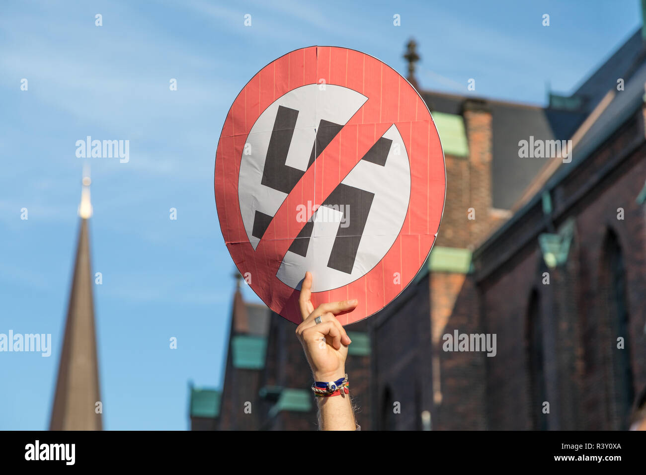 anti nazi protestor presenting banner Stock Photo