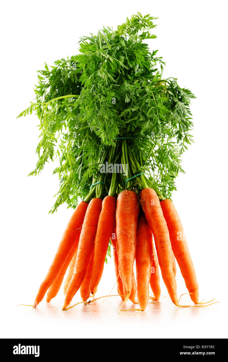 Fresh carrots bunch isolated on white Stock Photo
