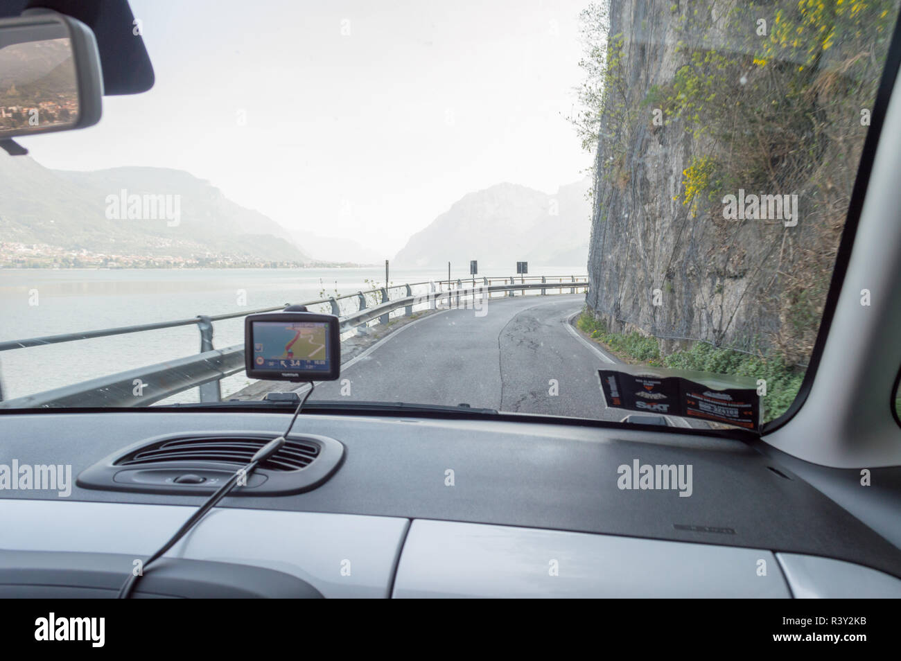 View through front window of a car. SIXT waiver and TomTom satnav sticking on the glass Stock Photo