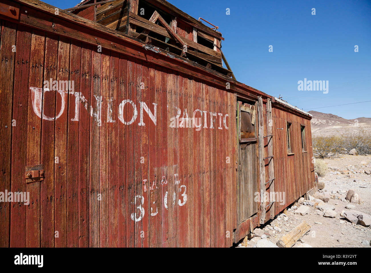 Caboose formerly used as a gas station, Rhyolite, Nevada, USA Stock Photo