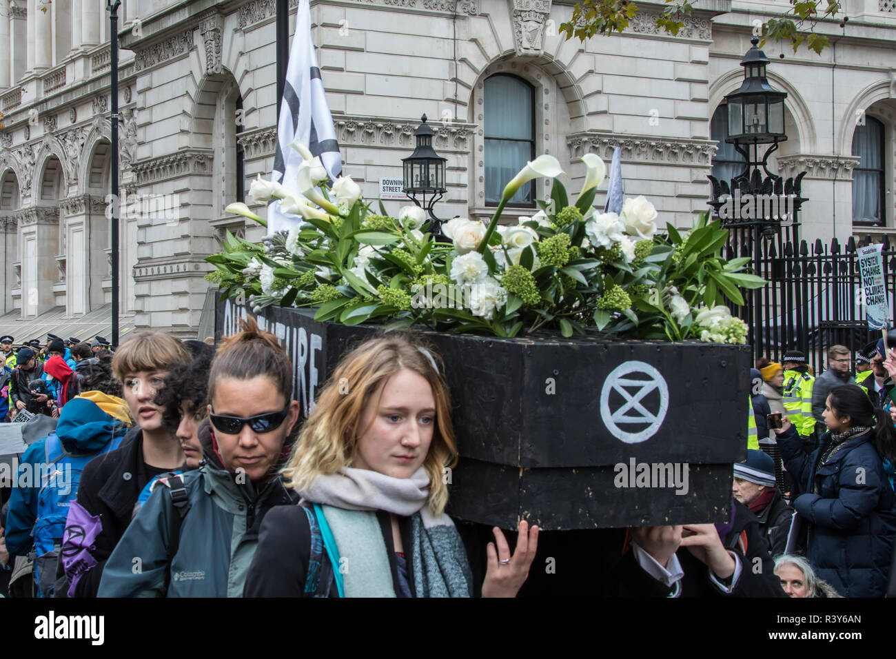 London, UK. 24th Nov 2018. 24 November, 2018. London,UK. 'Extinction Rebellion' climate protesters demonstrated in central London with a funeral procession which included a sit down outside Downing Street and a march to Buckingham Palace. Credit: David Rowe/Alamy Live News Stock Photo