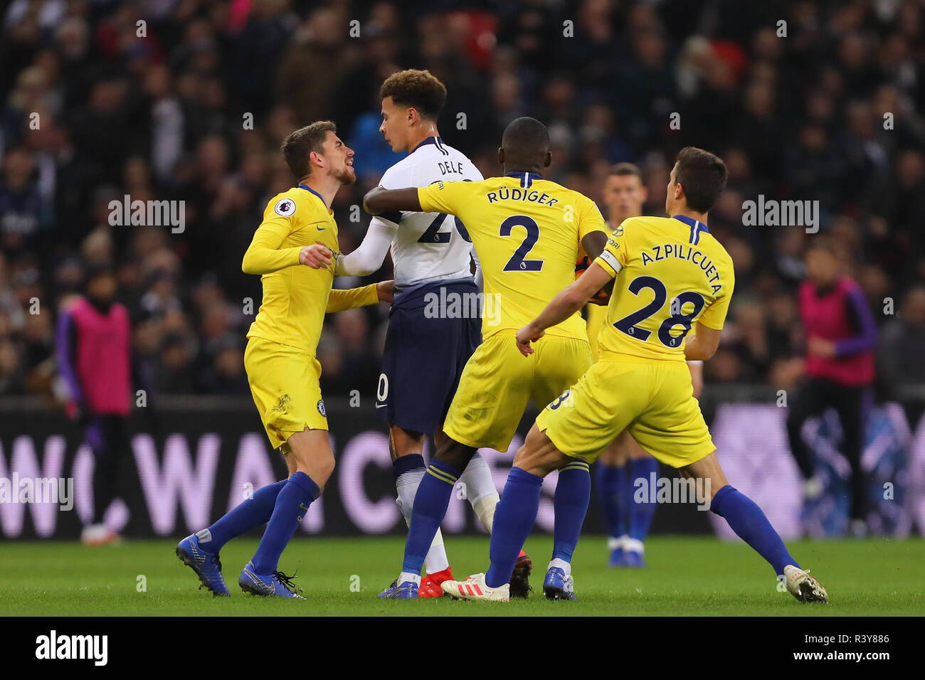 Dele Alli of Tottenham and Willian of Chelsea seen during the