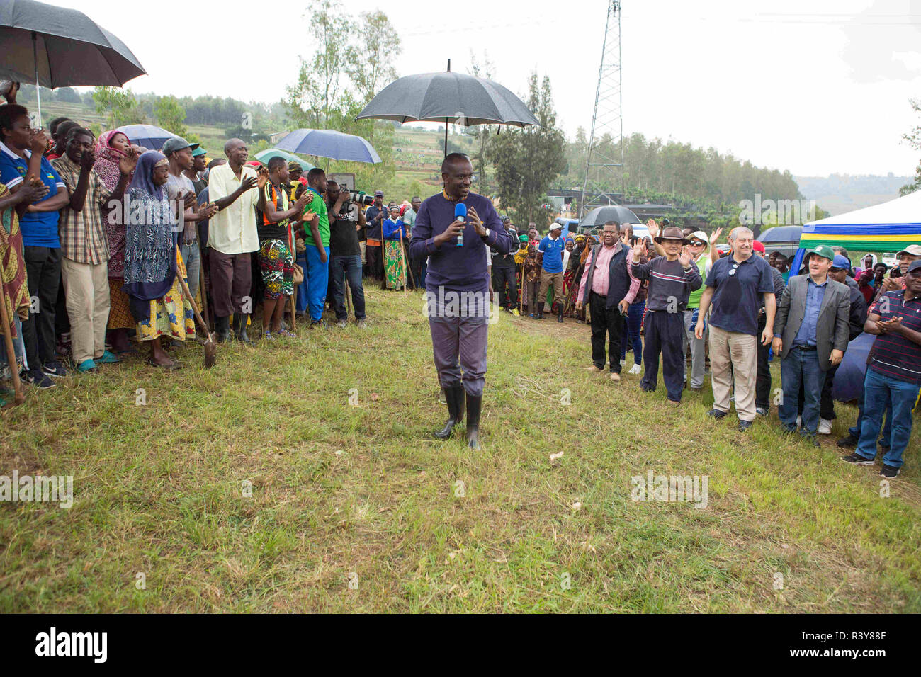 (181124) -- KAMONYI (RWANDA), Nov. 24, 2018 (Xinhua) -- Rwandan Foreign Minister Richard Sezibera (C) speaks during monthly community work, Umuganda, in Kamonyi district, central Rwanda, on Nov. 24, 2018. Diplomatic missions in Rwanda and Rwandan Ministry of Foreign Affairs and International Cooperation on Saturday organized a diplomatic Umuganda in Kamonyi. Taking root from Rwandan culture of self-help and cooperation, Umuganda, held on the last Saturday of the month, can be translated as "coming together in common purpose to achieve an outcome," according to Rwanda Governance Board. (Xinhua/ Stock Photo