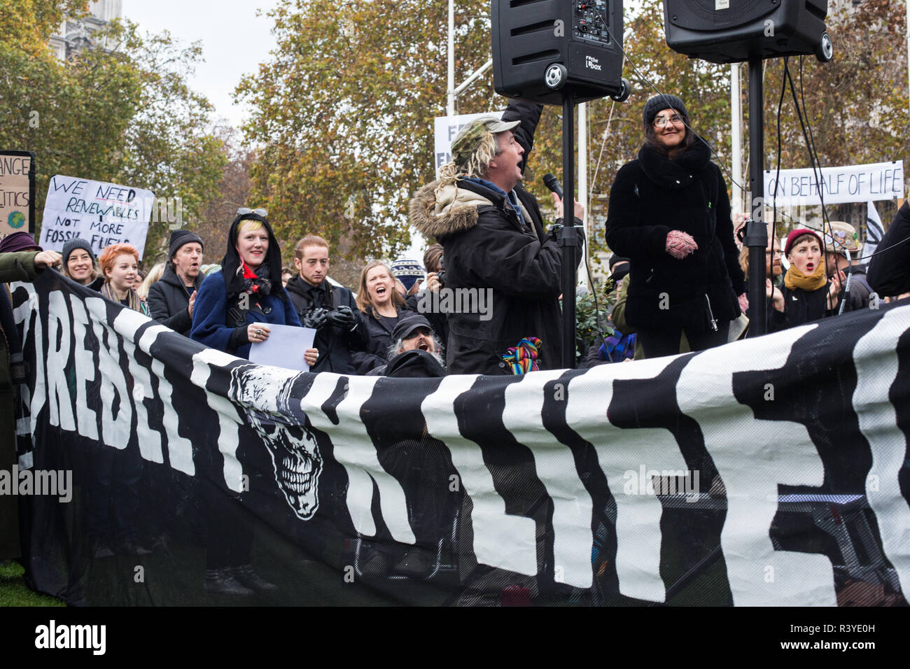 London, UK. 24th November, 2018. Environmental campaigners from Extinction Rebellion attend a Rebellion Day 2 event to highlight 'criminal inaction in the face of climate change catastrophe and ecological collapse' by the UK Government as part of a programme of civil disobedience during which scores of campaigners have been arrested. The event comprised a funeral ceremony in Parliament Square followed by a procession to Downing Street and Buckingham Palace. Credit: Mark Kerrison/Alamy Live News Stock Photo