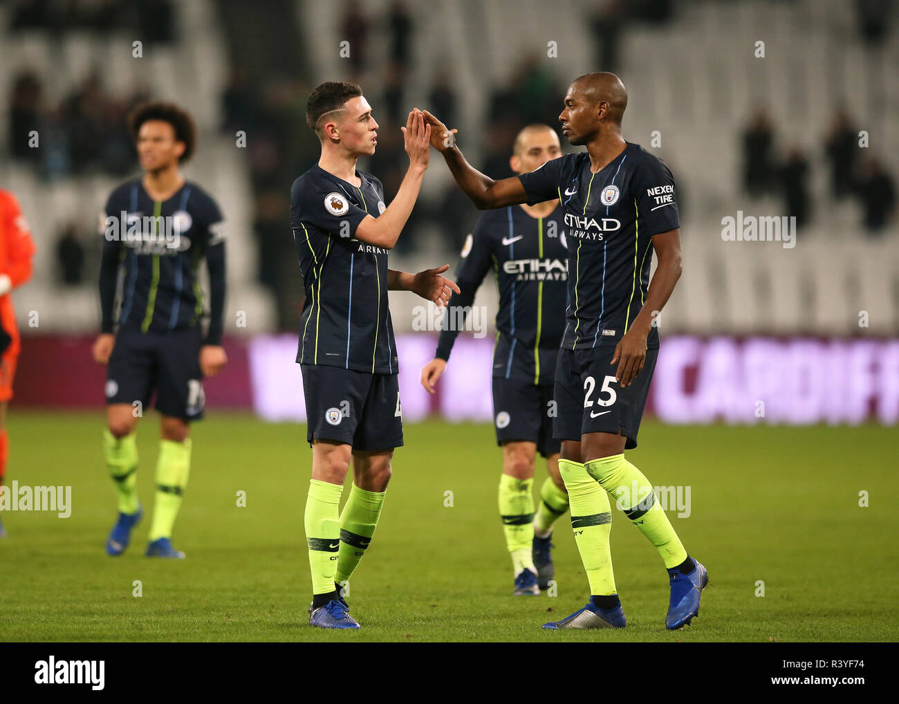 London Stadium, London, UK. 24th Nov, 2018. EPL Premier League football, West Ham United versus Manchester City; Phil Foden and Fernandinho of Manchester City celebrate after full time Credit: Action Plus Sports/Alamy Live News Stock Photo
