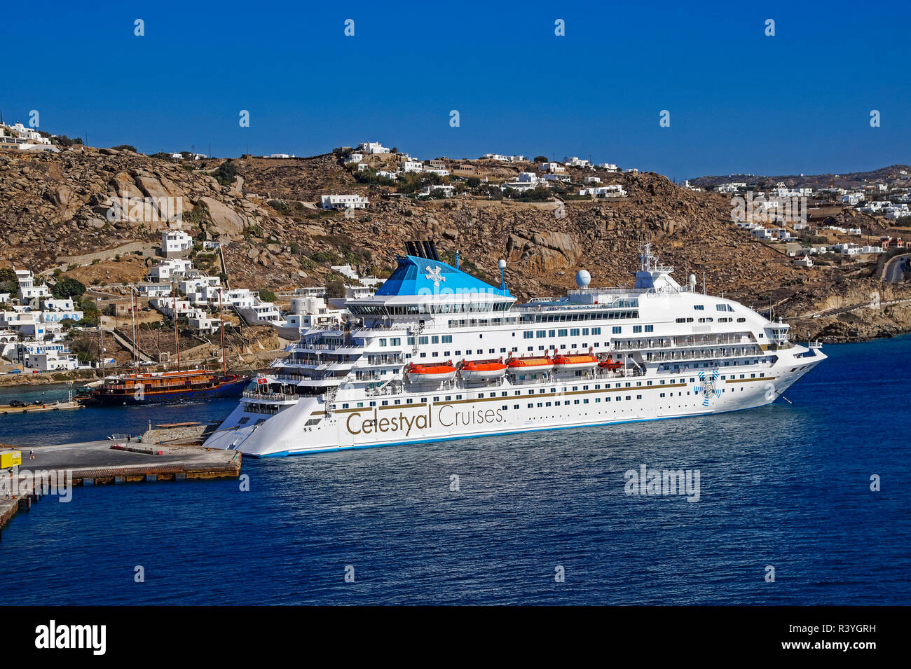 Celestyal Cruises cruise liner Celestyal Crystal moored in the harbour at Mykonos town on island Mykonos in the Cyclades group in Aegean Sea Greece Stock Photo