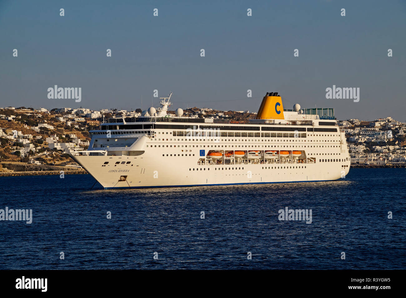 Costa Cruises cruise ship Costa Riviera at Mykonos town on island Mykonos in the Cyclades group in the Aegean Sea Greece Stock Photo