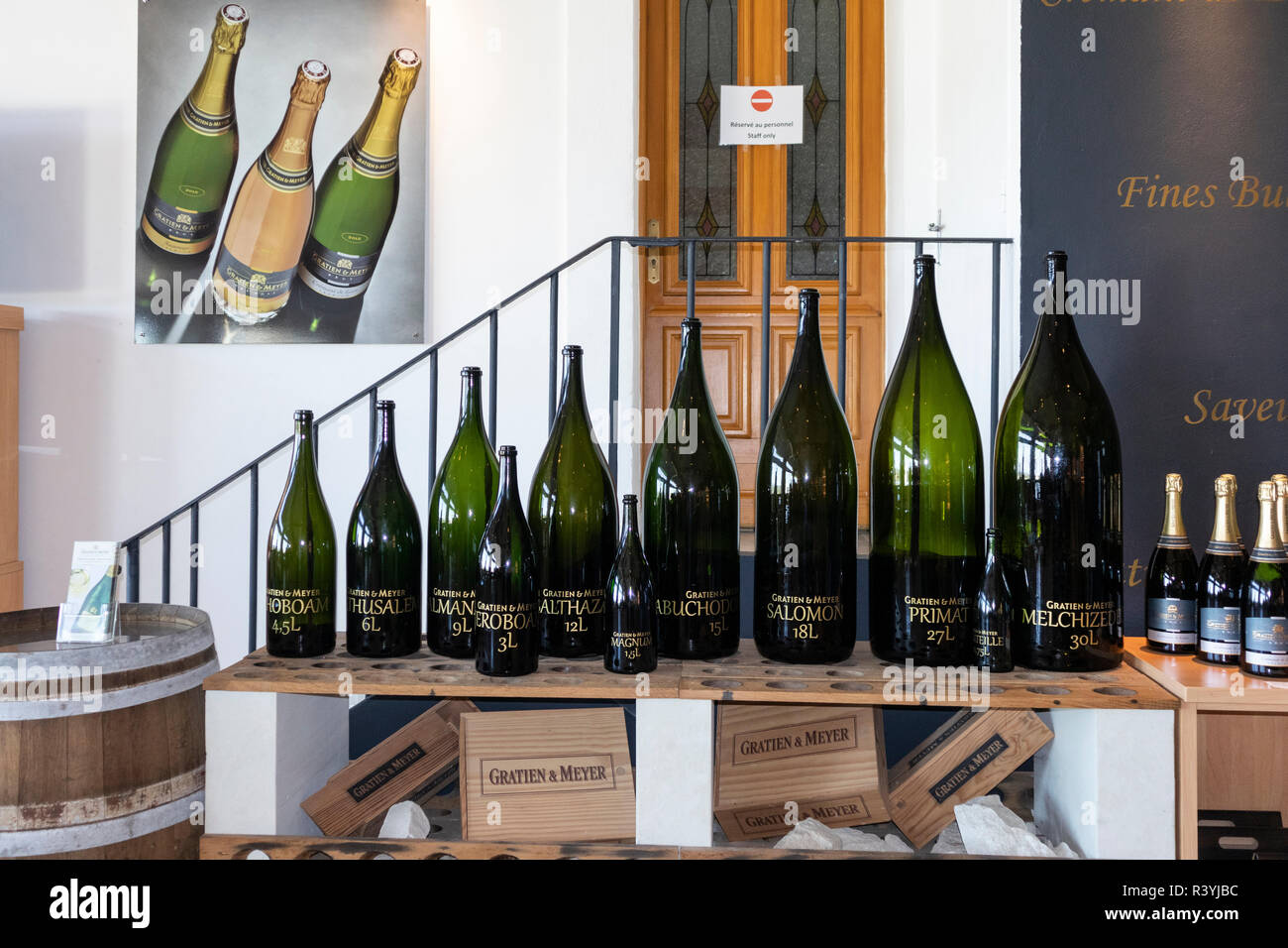 A display of the different sizes of Wine bottles at the Wine cave of Gratien & Meyer at Saumur, in the Loire Valley, France Stock Photo
