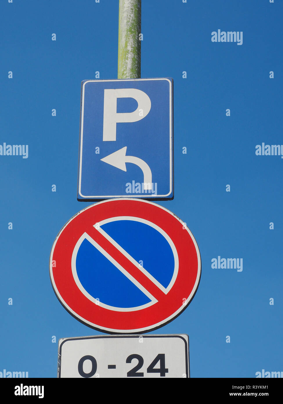 No parking sign over blue sky Stock Photo - Alamy