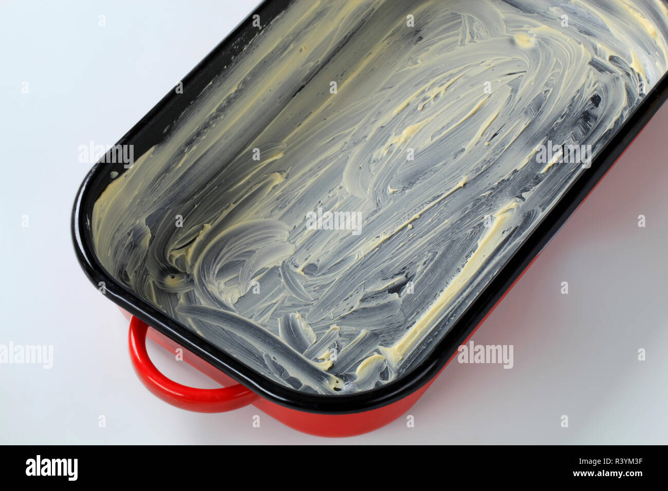 buttered baking pan Stock Photo - Alamy