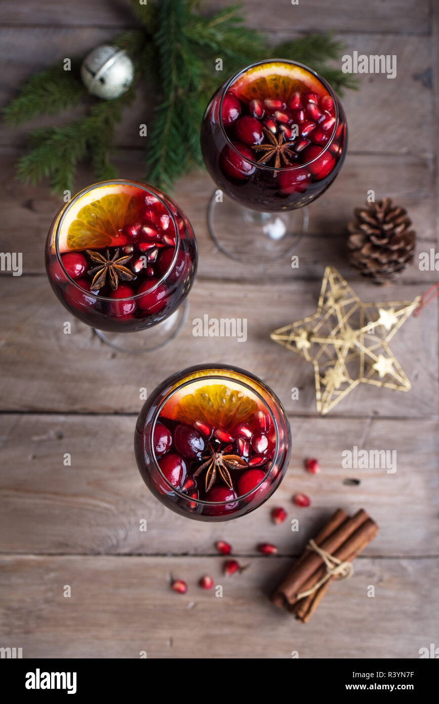 Red Sangria with oranges, pomegranate seeds, cranberry, rosemary ...