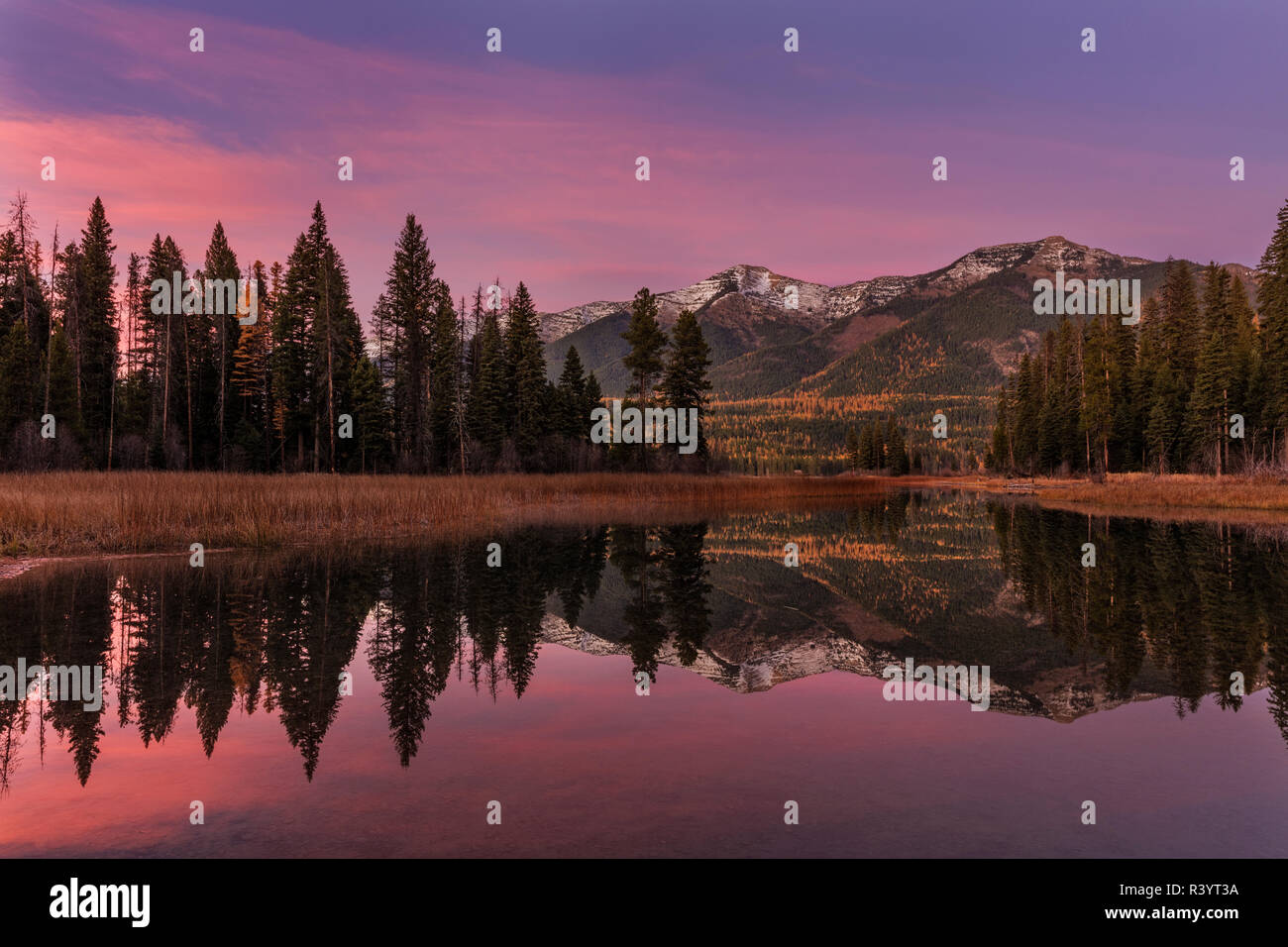 Swan Mountains reflecting into Holland Lake in the Flathead National