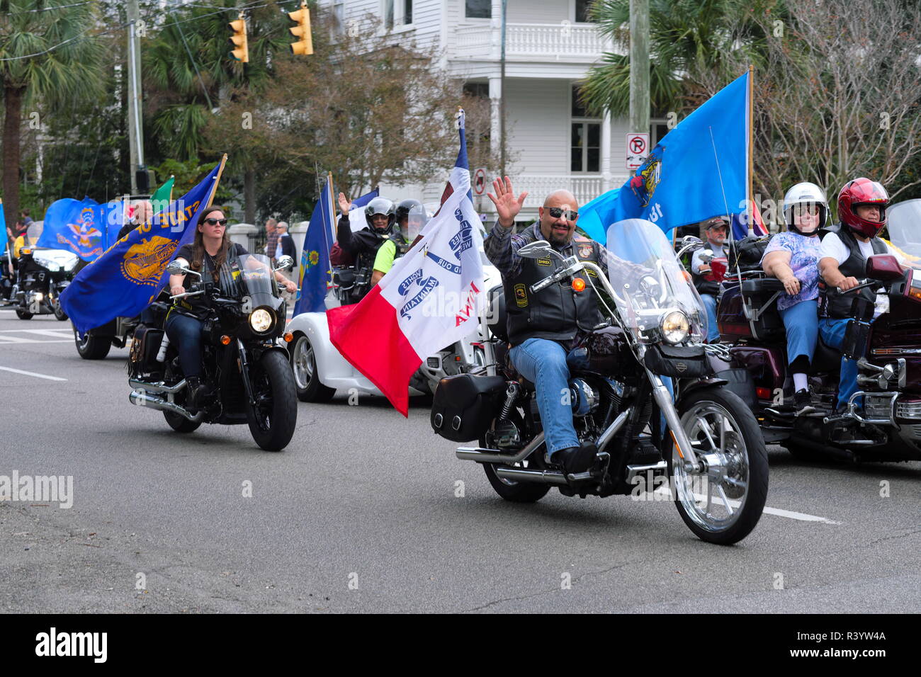 U.S. Veterans Day Parade of Motorcycles with Flags Flying Stock Photo