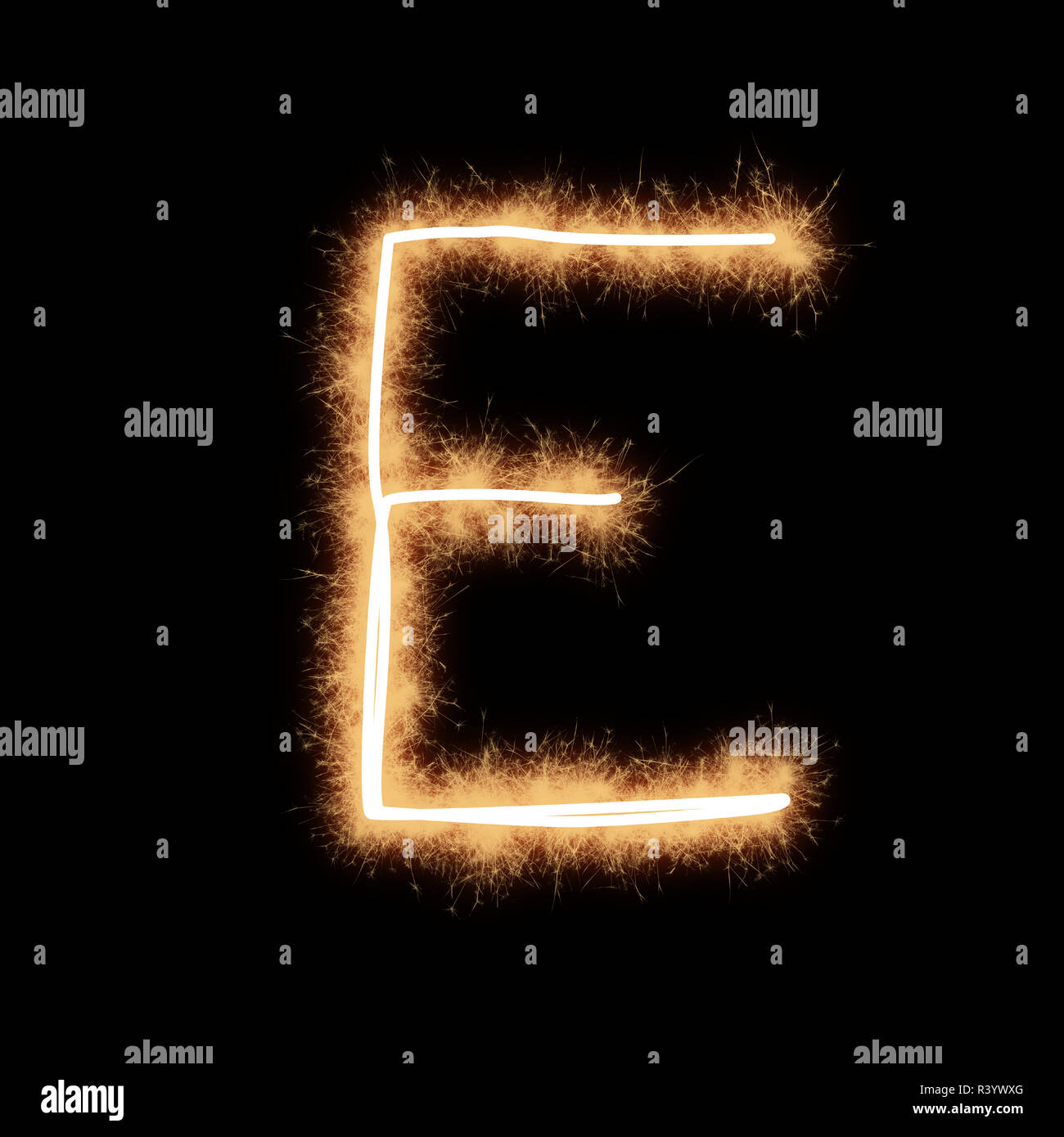 Letter E of alphabet written by squib sparks on a black background. Stock Photo