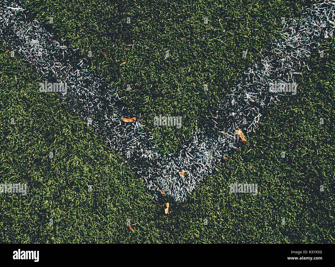 Football fierld corner. Close up corner of white line paint on green