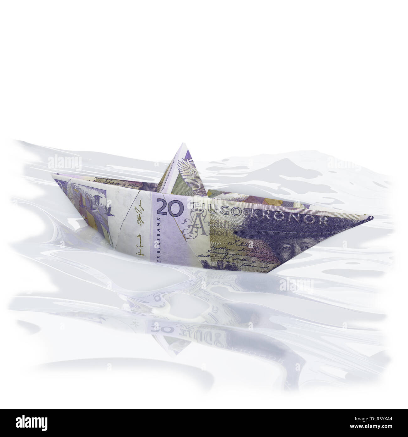 paper boat with 20 swedish crowns Stock Photo