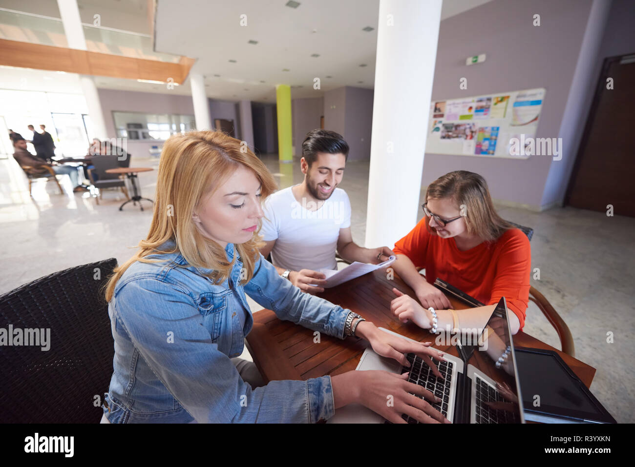students group working on school project together Stock Photo - Alamy