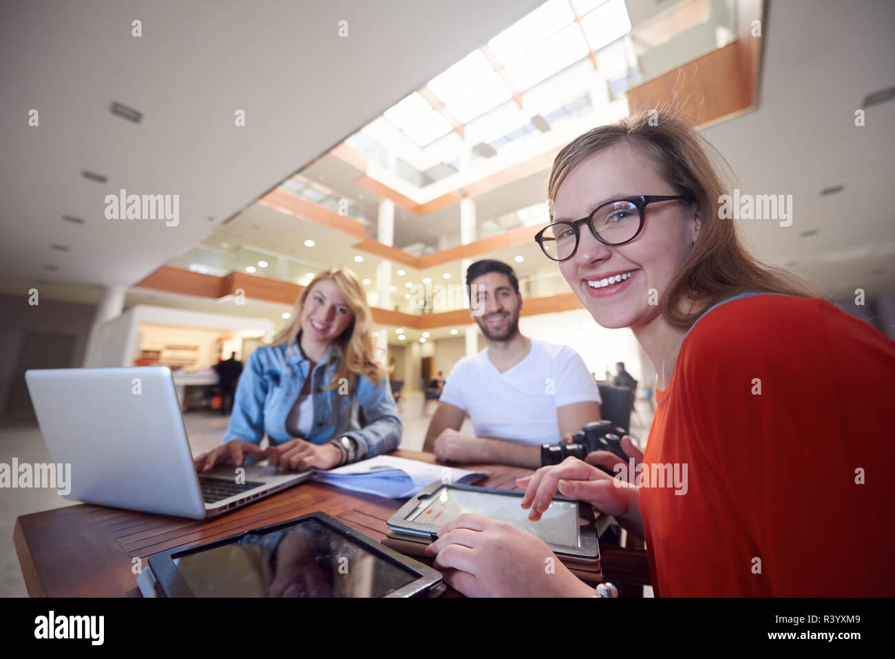 students group working on school project together Stock Photo - Alamy