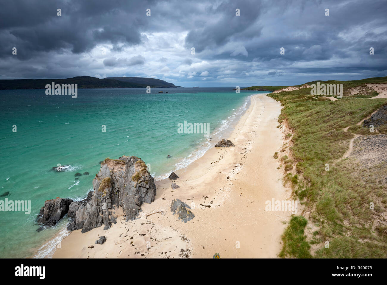 Sandy beach and cliffs at Cape Balnakeil, Durness, Caithness, Sutherland and Easter Ross, Scotland, United Kingdom Stock Photo