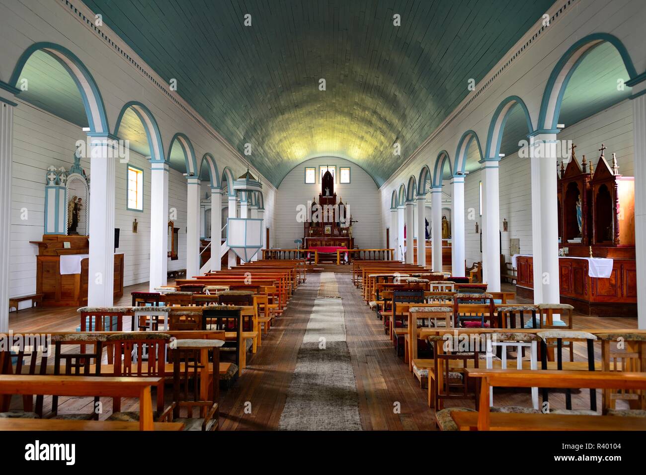Interior of the wooden church Iglesia de Nuestra Señora del Patrocinio, UNESCO World Heritage Site, Tenaùn, Chiloé Island Stock Photo