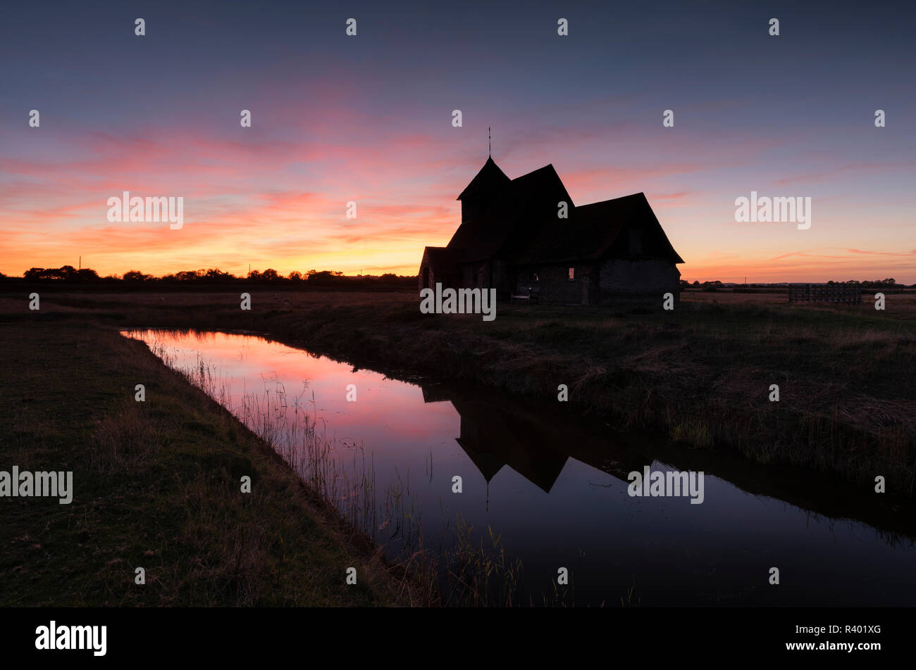 St. Thomas a Becket Church, also known as Fairfield Church, silhouetted at twilight on Romney Marsh, Kent. Stock Photo