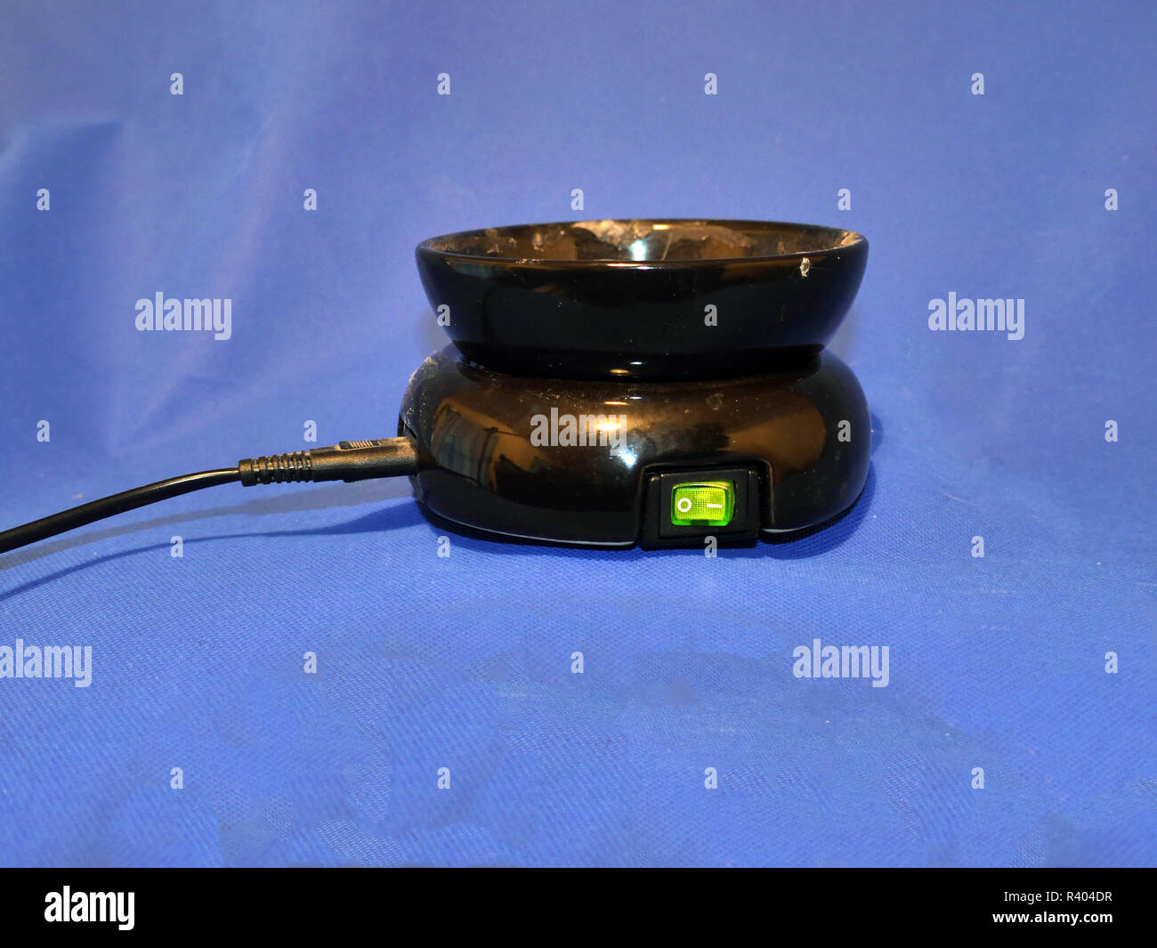 Wax Heater that melts wax solid refills to produce a pleasant smell to scent your rooms Stock